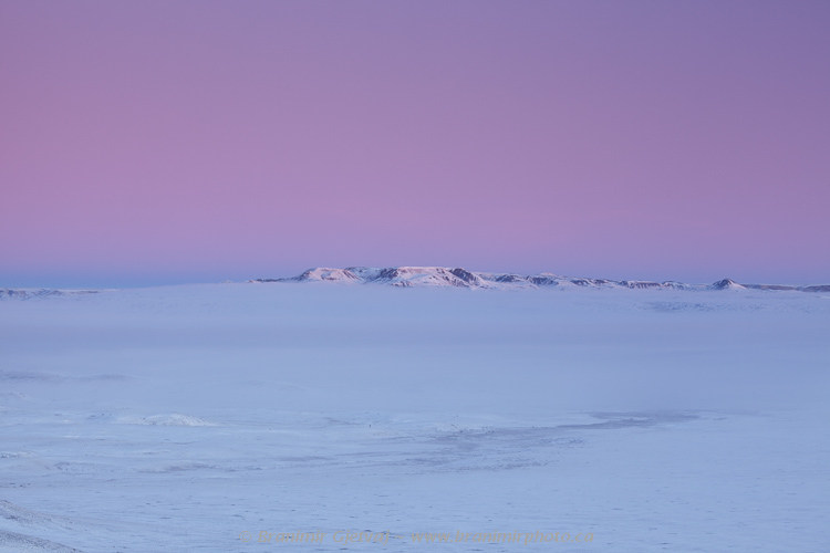 Misty sunrise over Frenchman River Valley and 70 Mile Butte, Grasslands National Park (West Block), Saskatchewan