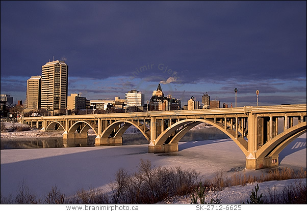 Saskatoon skyline with Broadway Bridge at sunset